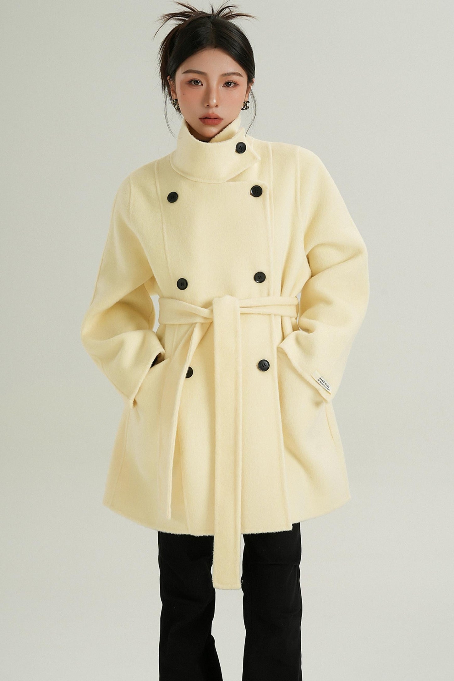 Tailored women's outerwear in cream color