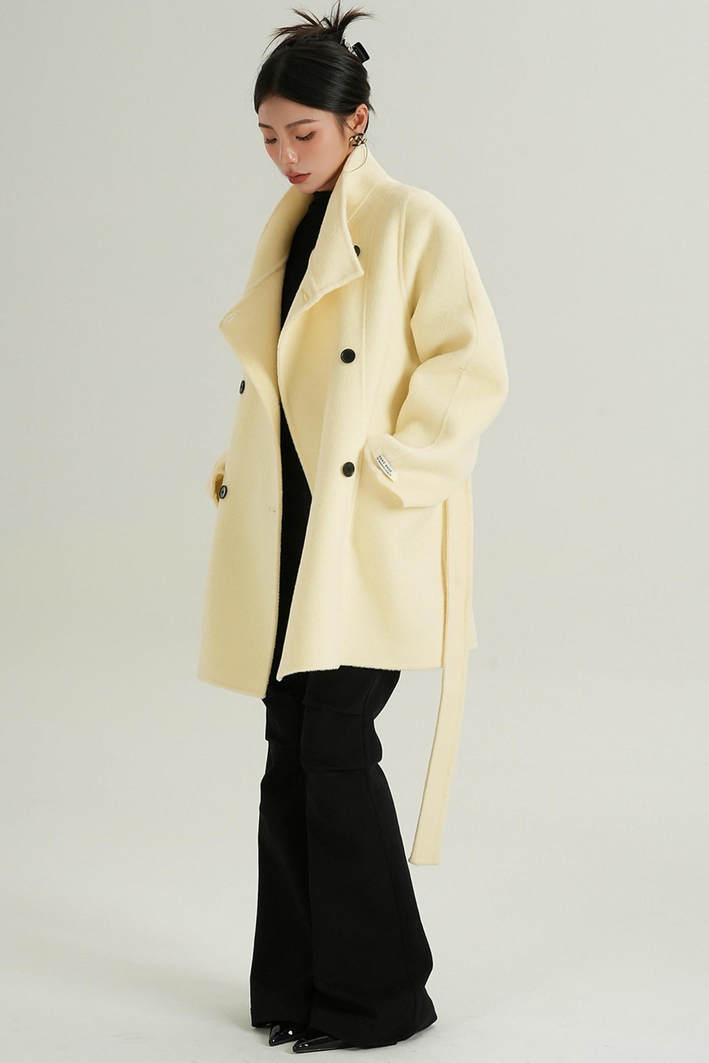 Tailored women's outerwear in cream color