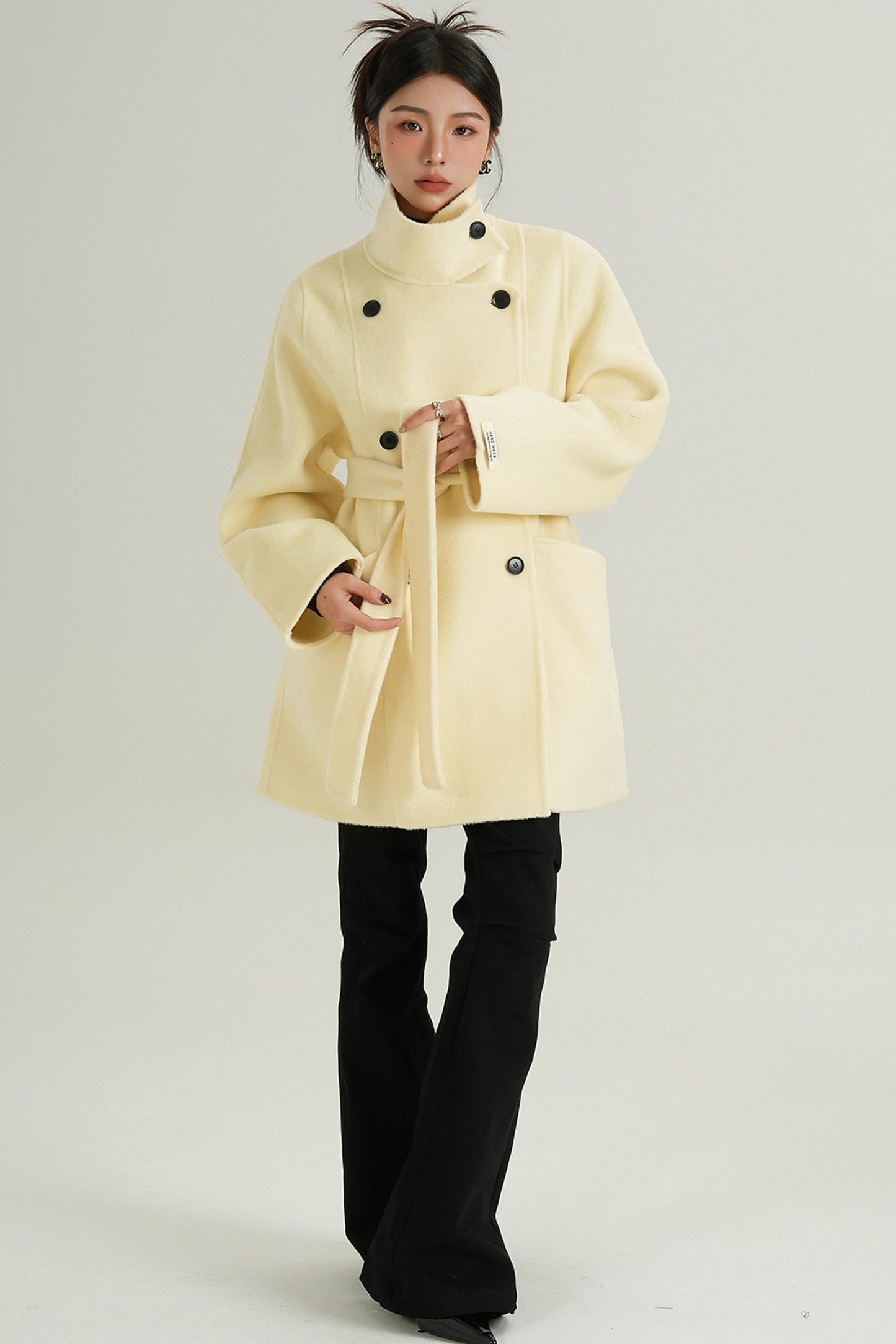 Tailored women's outerwear in cream color